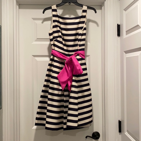 Black and cream striped dress with pink sash/bow. - Picture 1 of 3